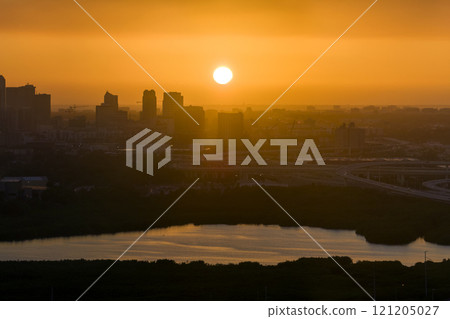 Urban sunset landscape of downtown district of Tampa city in Florida, USA. Dramatic skyline with high skyscraper buildings in modern american megapolis 121205027