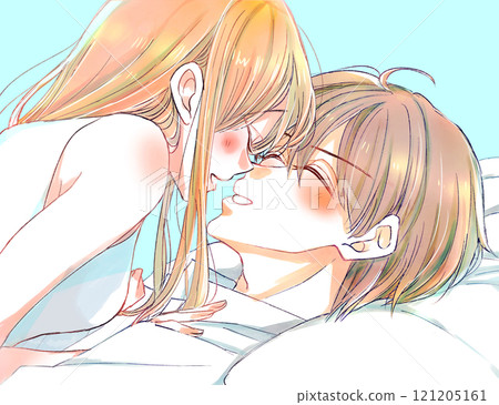 一對男女情侶在床上玩耍，微笑著 121205161