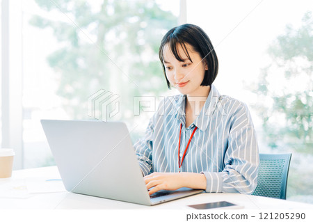 A woman who plays desk work A woman who plays desk work 121205290