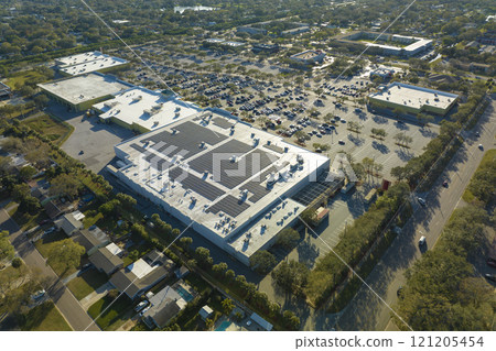Top view of many cars parked on a parking lot in front of a shopping mall in Florida. Concept of urban transportation 121205454