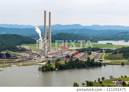 Thermal power station producing electricity by burning coal fossil fuel. Kingston power plant in Roane County near Kingston, Tennessee Thermal power station producing electricity by burning coal fossil fuel. Kingston power plant in Roane County near Kingston, Tennessee 121205475