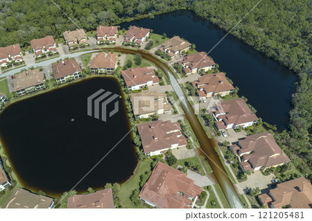 Surrounded by hurricane Ian rainfall flood waters homes in Florida residential area. Aftermath of natural disaster 121205481