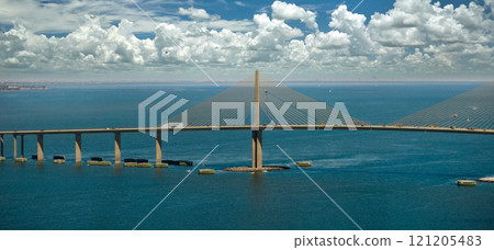 Sunshine Skyway Bridge over Tampa Bay in Florida with moving traffic. Concept of transportation infrastructure 121205483