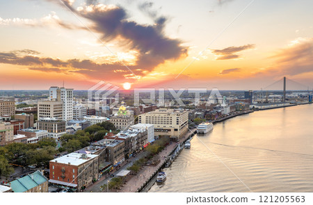 Savannah, Georgia. Famous historic River Street with waterfront tourist attractions. USA cityscape at sunset 121205563