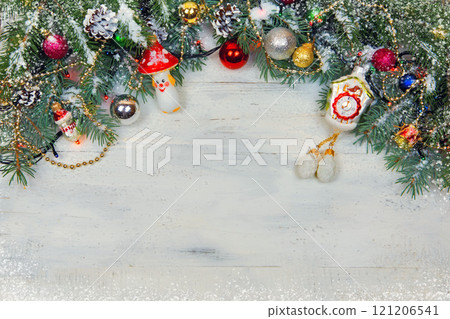 Christmas wooden background with snow branch. Top view with copy space for your text Christmas wooden background with snow branch. Top view with copy space for your text 121206541