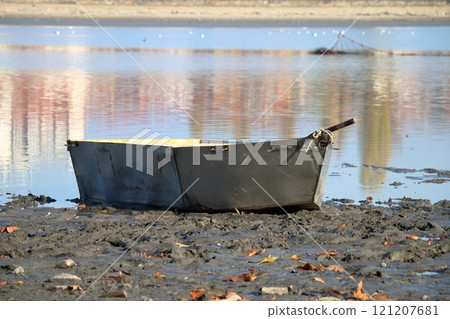Abandoned boat on the lake. Abandoned boat on the lake. 121207681