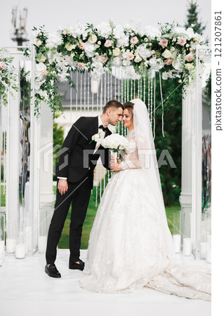 Close up of a nice young wedding couple 121207861