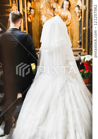 Wedding couple bide and groom get married in a church 121207862
