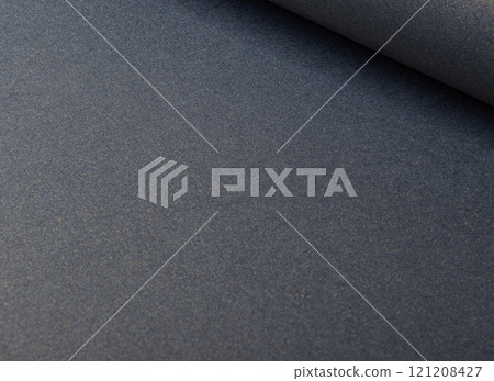 Luxurious muted blue paper background with a soft gradient and subtle grainy texture. Matte and 121208427