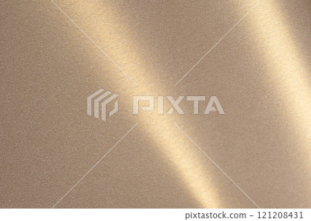 Luxurious paper background with a soft monochrome gradient in warm taupe and champagne tones. Smooth 121208431
