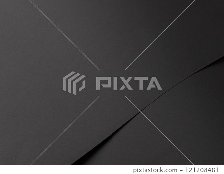 Elegant black paper background with a smooth matte texture and subtle gradient. Deep and rich tones 121208481