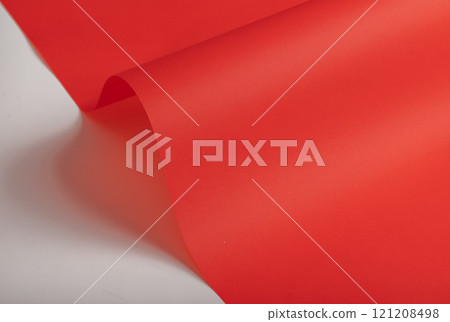 Elegant scarlet red paper background with a fine texture and subtle gradient. Featuring soft folds Elegant scarlet red paper background with a fine texture and subtle gradient. Featuring soft folds 121208498