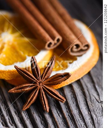 Aromatic Christmas concept with cinnamon sticks Aromatic Christmas concept with cinnamon sticks 121208642
