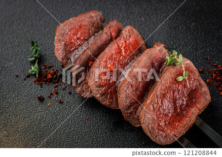 sliced beef steak Medium Rare. Restaurant menu, dieting, cookbook recipe top view 121208844