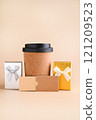 Eco-Friendly Coffee Cup with Gift Boxes Minimalist Holiday Gift Concept. tylish image featuring an 121209523