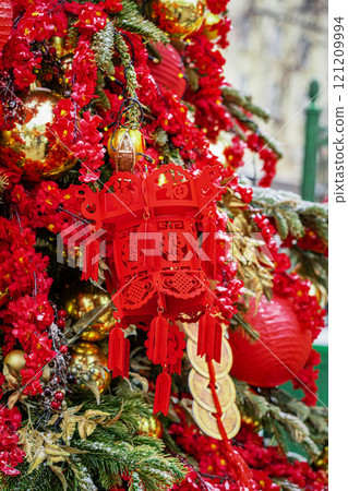 Red lantern and vivid decorations create vibrant celebration of Chinese culture, festive season. 121209994