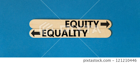 Equity or equality symbol. Concept word Equity or Equality on beautiful wooden stick. Beautiful blue table blue background. Business and equity or equality concept. Copy space. Equity or equality symbol. Concept word Equity or Equality on beautiful wooden stick. Beautiful blue table blue background. Business and equity or equality concept. Copy space. 121210446