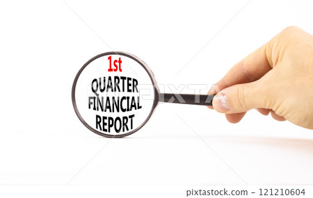 1st quarter financial report symbol. Concept words 1st quarter financial report on beautiful magnifying glass. Beautiful white background. Business 1st quarter financial report concept. Copy space. 121210604