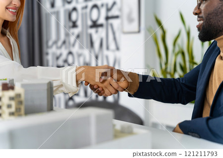Close up of a handshaking after a good deal Close up of a handshaking after a good deal 121211793
