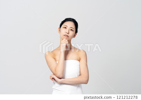 A young woman worried about beauty and dieting A young woman worried about beauty and dieting 121212278