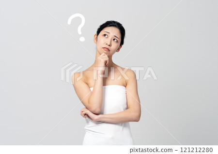 A young woman worried about beauty and dieting A young woman worried about beauty and dieting 121212280