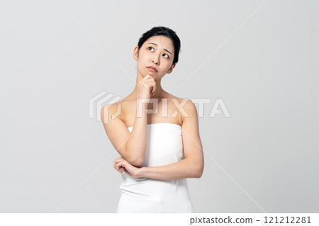 A young woman worried about beauty and dieting 121212281