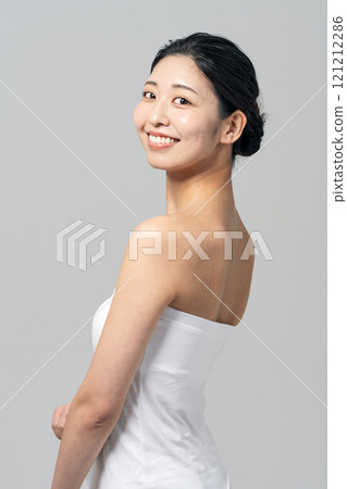 Beauty image of a young woman wearing a tube top Beauty image of a young woman wearing a tube top 121212286