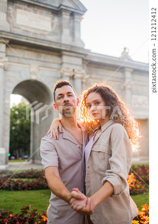 Couple dancing swing in front of Puerta de Alcalain Madrid 121212412