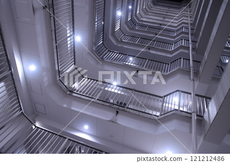 [Image] A stairwell in an apartment building at night, standing tall like a wall 121212486