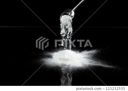 Tapioca starch flour fly explosion, White powder tapioca starch fall down in air. Seasoning flour powder is element material. Eyeshadow crush make up. Black background Isolated selective focus blur 121212535