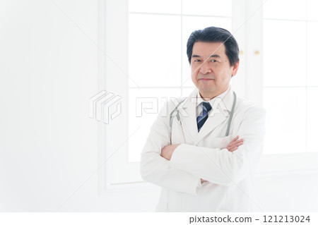 Male doctor in white coat Male doctor in white coat 121213024