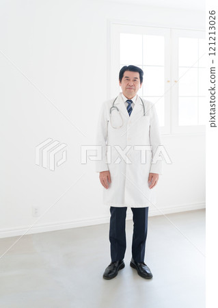 Male doctor in white coat Male doctor in white coat 121213026