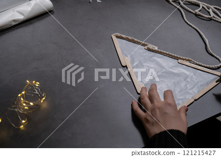 Ice cream sticks Christmas tree Sustainable preparation Diy process making handmade decoration. Step by step activity for children. Inclusive and responsible stress relief holiday hobby Ice cream sticks Christmas tree Sustainable preparation Diy process making handmade decoration. Step by step activity for children. Inclusive and responsible stress relief holiday hobby 121215427