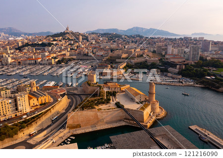 Marseille cityscape on Mediterranean coast overlooking Old Port and Fort Saint-Jean 121216090