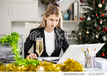 Businesswoman working at Christmas 121216577