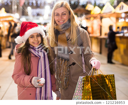 Friendly family of mother and daughter having fun 121216953
