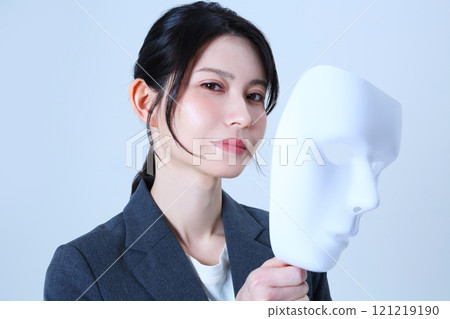 Image of a female office worker wearing a mask 121219190
