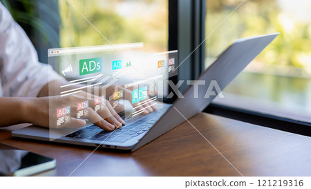 Online advertisement, Digital marketing concept, Woman using laptop and tablet with Ads dashboard digital marketing strategy analysis for branding, BAd on website and social media, SEO. Online advertisement, Digital marketing concept, Woman using laptop and tablet with Ads dashboard digital marketing strategy analysis for branding, BAd on website and social media, SEO. 121219316