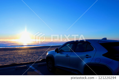 The sunrise seen from the car window The sunrise seen from the car window 121220294