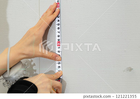 Positioning hooks for framed photographs Positioning hooks for framed photographs 121221355