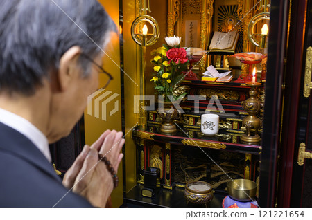 A man visiting a grave 121221654