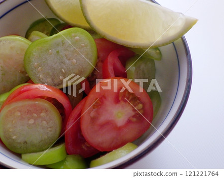 Tomatillo and tomato salad with lime Tomatillo and tomato salad with lime 121221764