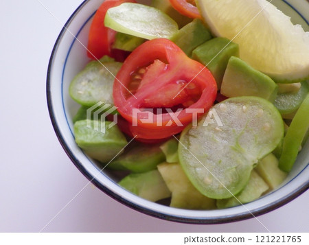 Tomatillo, tomato and avocado salad with lime Tomatillo, tomato and avocado salad with lime 121221765
