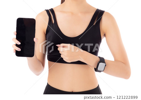 Closeup hands young asian woman in sportswear workout holding and presenting blank screen smartphone 121222899