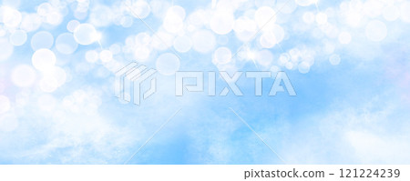 A light blue sparkling winter background with the image of snow 121224239