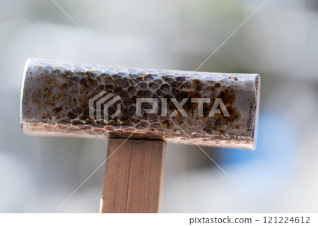 Hammer driving a nail 121224612