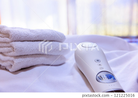 Towel and light hair removal device 121225016