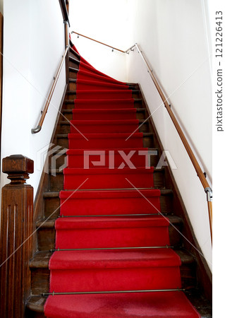 A red carpeted staircase exuding the romance of the Taisho period A red carpeted staircase exuding the romance of the Taisho period 121226413