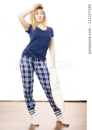 Sleepy woman wearing pajamas Sleepy woman wearing pajamas 121227160