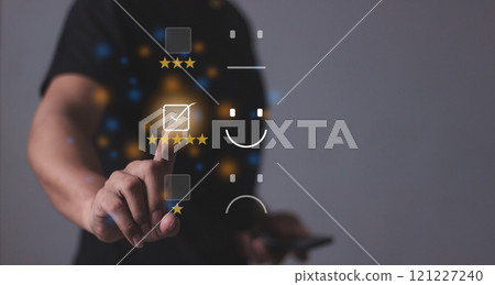 Customer Review, Young Man with smartphone mobile hand touching five star to review and give 5 stars Customer Review, Young Man with smartphone mobile hand touching five star to review and give 5 stars 121227240
